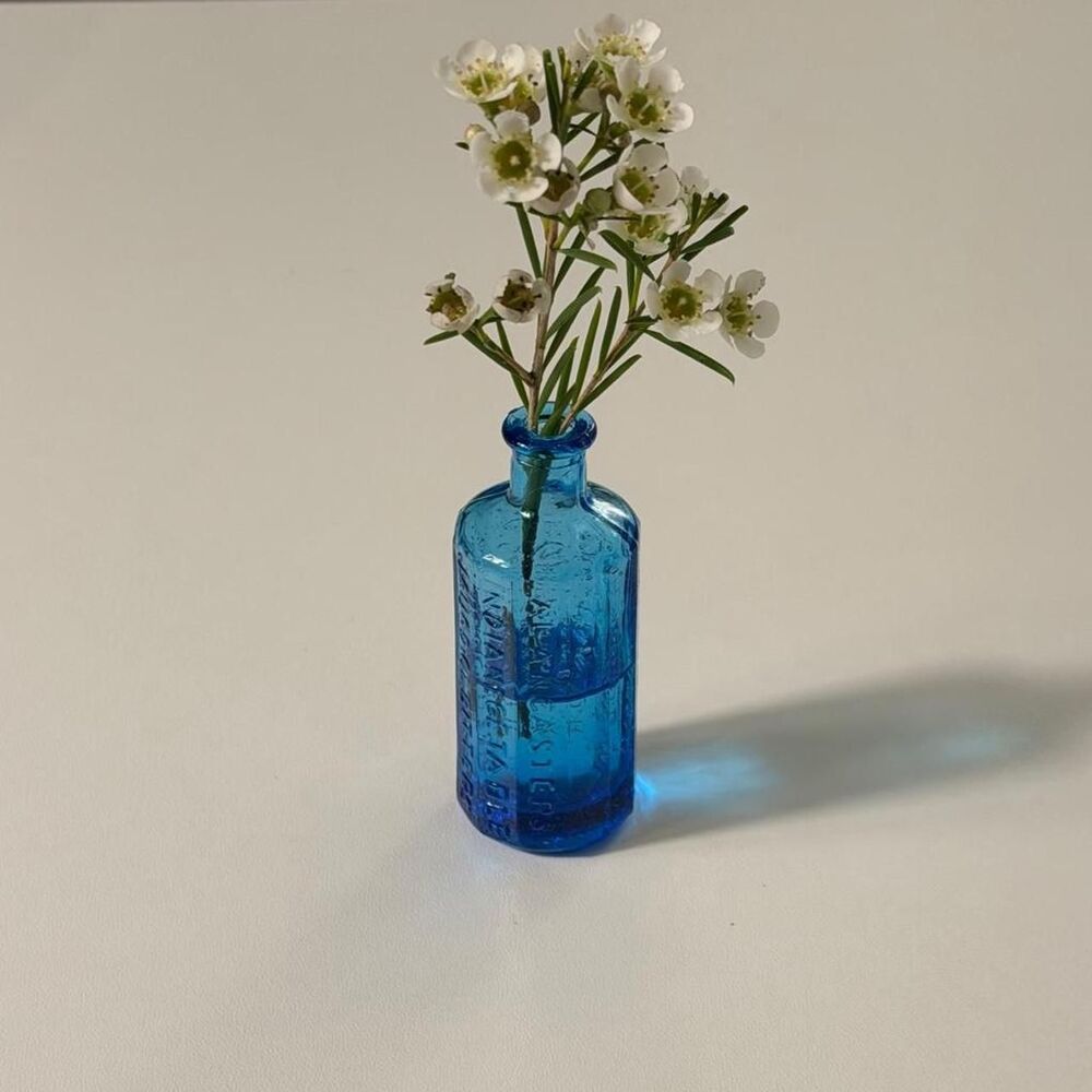 Vintage 1970s cobalt blue apothecary bottle